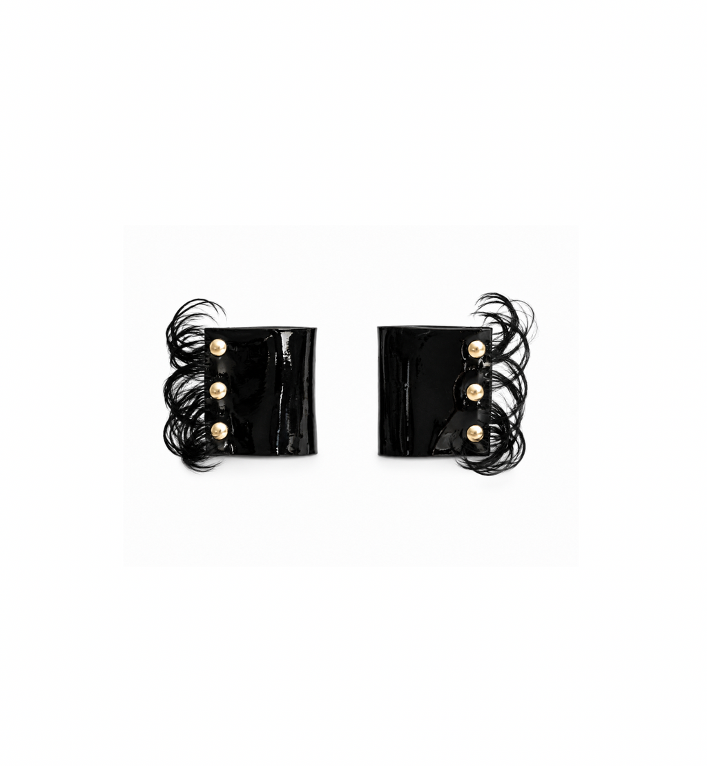 27 PIECE PATENT LEATHER CUFFS
